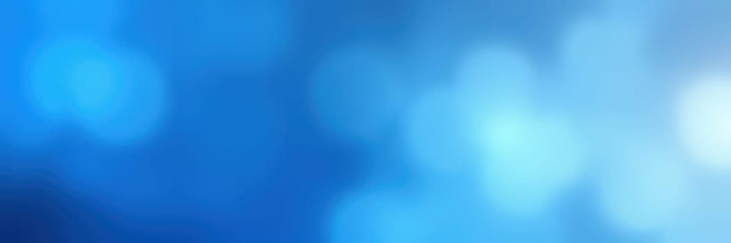 Colorful background featuring various shades of blue and soft bokeh effects. This tranquil setting is ideal for design projects, presentations, or digital media.