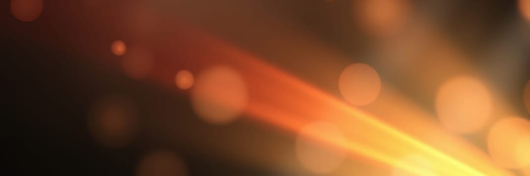 Bright streaks of orange and gold light emerge from a dark background, casting warm reflections. The play of light creates a dynamic and engaging atmosphere that invites exploration.