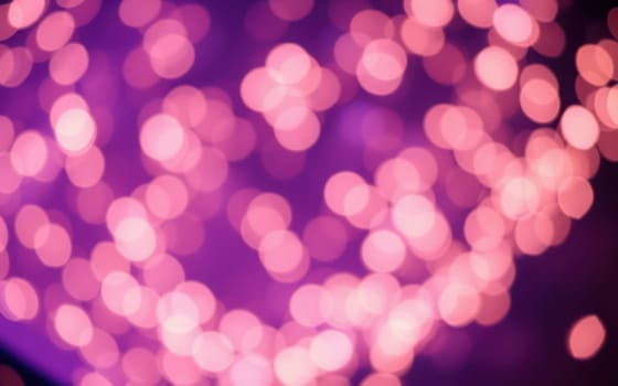 Soft, colorful lights form a beautiful bokeh effect, enhancing the enchanting ambiance of a vibrant nighttime gathering in the city, evoking a festive feel.