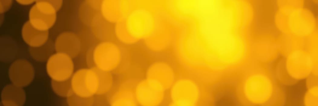 Soft golden bokeh lights shimmer in the background, adding a warm and inviting ambiance to a lively evening celebration event filled with joy and excitement.
