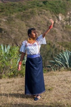 Young Indigenous Girl Honors Her Ancestors with a Traditional Dance. High quality photo