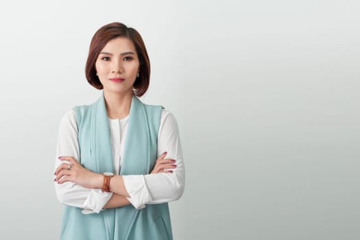 Portrait of successful business asian women in shirt with arms crossed and smile