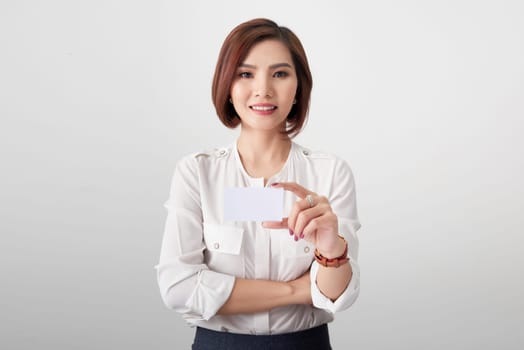 Smiling business woman show credit card. Isolated portrait. Banner