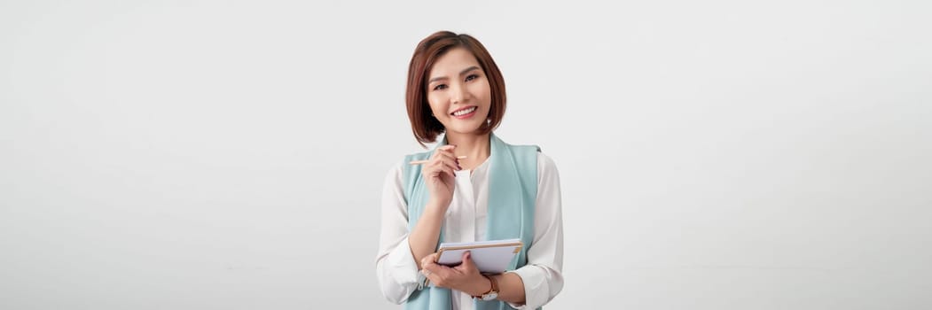 Happy businesswoman reading her notes. Panorama.