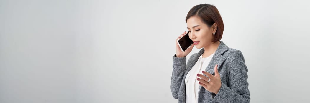 Business woman talking on the phone - isolated over white banner