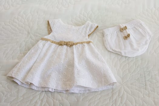 White dress and panties for the newborn girl