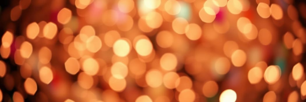 Bright orange bokeh lights illuminate the evening, creating a warm and joyful atmosphere for a festive gathering. The lights twinkle softly, enhancing the ambiance of the celebration.