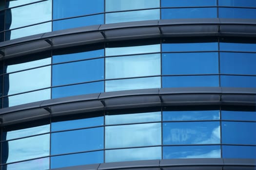 A sleek and stylish building facade that beautifully showcases stunning modern glass architecture