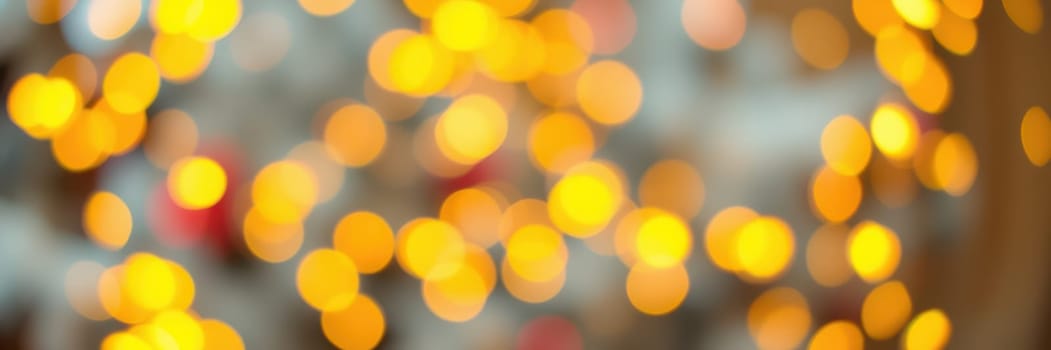 Softly glowing golden lights fill the background, creating a cozy and inviting atmosphere for a festive gathering. The scene embodies the joy of the holiday season.