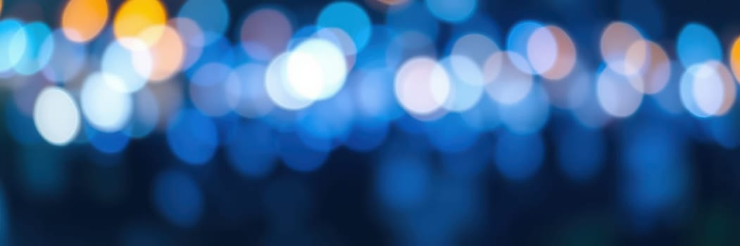 Bright lights illuminate the cityscape, creating a captivating bokeh effect. People gather to enjoy festivities in the lively atmosphere of the urban night.
