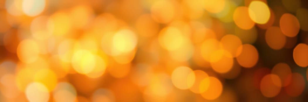 The scene features a rich array of soft golden bokeh lights, creating a warm ambiance. This captivating visual highlights the festive spirit often experienced during evening gatherings.