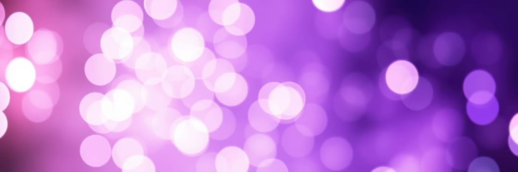 A mesmerizing display of purple and pink bokeh lights creates a dynamic and colorful background, perfect for enhancing events, celebrations, or artistic projects during evening gatherings.