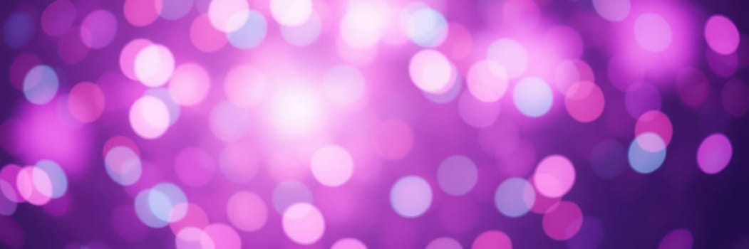 Colorful bokeh lights in shades of purple create a soft, enchanting background perfect for parties, celebrations, and special occasions. The luminous dots enhance the festive mood.