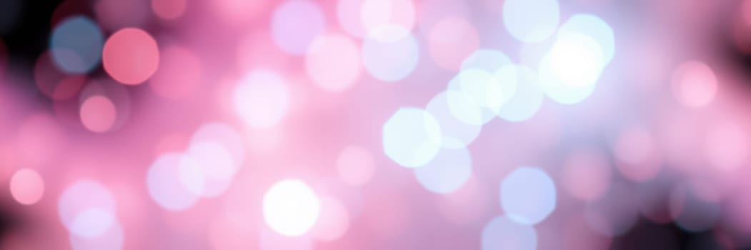 Vibrant bokeh lights illuminate the night, creating a magical ambiance at an outdoor celebration in a bustling city. Guests enjoy the festive atmosphere under the twinkling lights.