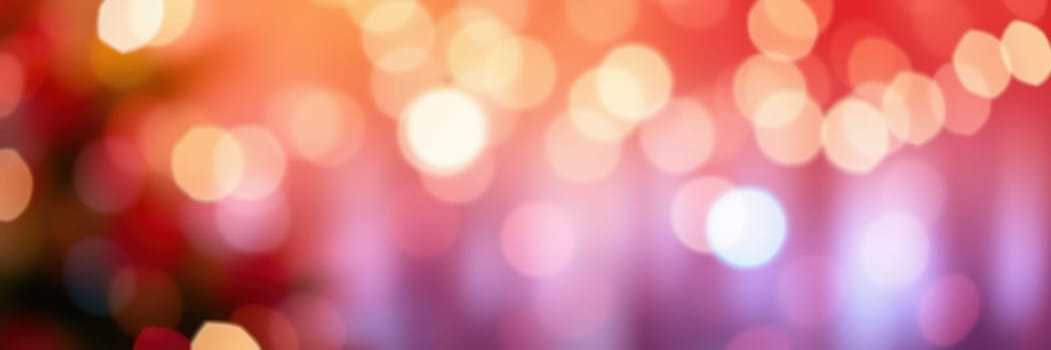 Soft, colorful bokeh lights shimmer in a vibrant display, setting a joyful mood for a nighttime celebration in an urban environment.