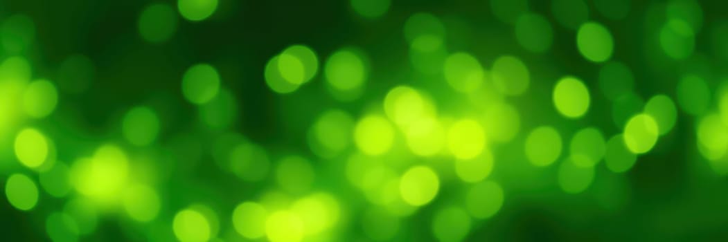 Vibrant green bokeh lights fill the air, casting a festive ambiance as people gather in a tranquil park during the evening hours, celebrating together.