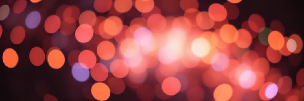 Vibrant bursts of light fill the night sky, setting a festive mood during a lively urban celebration. Colors blend beautifully, enhancing the joyful atmosphere around.