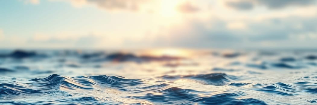 The vast ocean stretches under a golden sky, showcasing gentle waves reflecting the warm hues of sunset. The scene evokes a sense of calm and serenity along the shoreline.