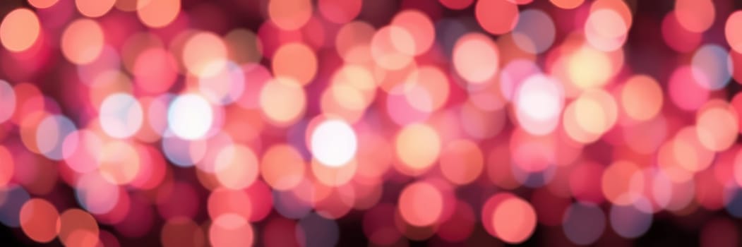 Bright, colorful orbs of light fill the background, creating a vibrant, festive mood for an evening celebration. The bokeh effect enhances the joyful ambiance.