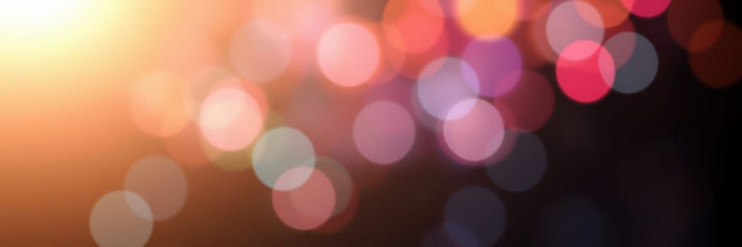 Bright bokeh lights form a mesmerizing backdrop for a lively event, creating an enchanting atmosphere filled with warmth and excitement during the evening.