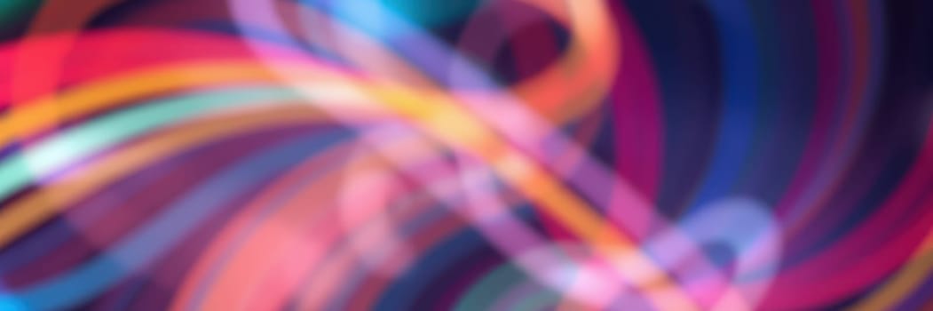A striking blend of vivid colors intertwines in an abstract design, showcasing a sense of movement and energy. This digital artwork captivates with its fluid lines and radiant hues.