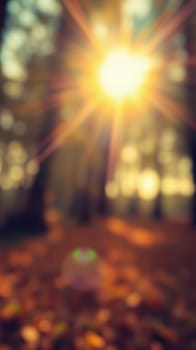 Warm rays of sunlight shine through tall trees in a peaceful forest. Leaves softly rustle as the day begins, creating a tranquil atmosphere filled with natural beauty.