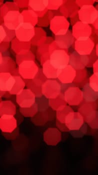 A vivid array of red bokeh lights fills the space, creating a warm and festive ambiance ideal for parties and special occasions. The soft focus adds depth and charm.