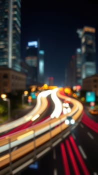 Bright headlights and taillights create dynamic light trails on a busy roadway amid tall buildings. The city skyline shines with neon signs under the dark sky, capturing nighttime energy.