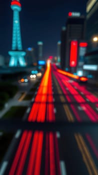 Colorful trails of car lights streak down a busy street lined with tall buildings. The night sky enhances the lively atmosphere as city life pulses with energy and motion.