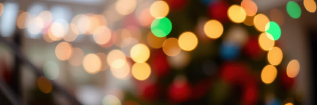 Twinkling lights in various colors illuminate a warm indoor setting, creating a joyful holiday atmosphere. This cozy environment evokes feelings of celebration and togetherness.