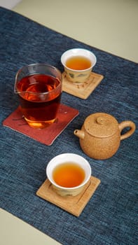 A serene setup with a delightful teapot and elegant cups of brewed tea, perfect for relaxation and enjoyment