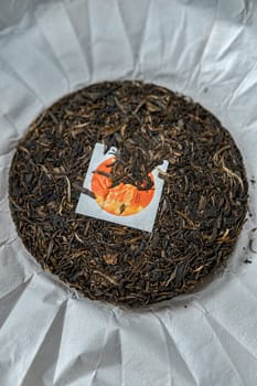 A detailed view of a beautifully crafted tea cake showcasing its unique blend and innovative packaging design