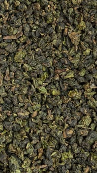 A captivating view of various dried green tea leaves highlighting their rich textures and vibrant colors