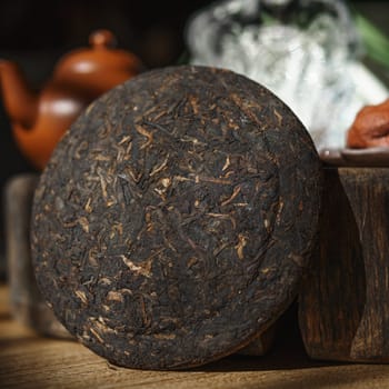 An exquisite, aged puerh tea cake that beautifully highlights and celebrates traditional tea culture and history