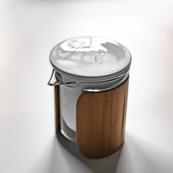 This is a modern glass jar that comes with an elegant bamboo lid, perfect for trendy and stylish storage solutions