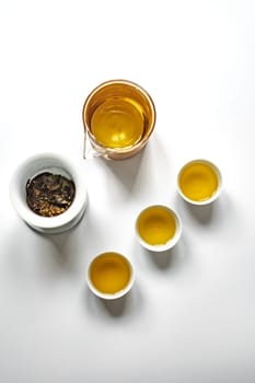 A beautifully serene tea setup featuring elegant cups and freshly brewed tea, ideal for deep relaxation and wellness