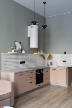 A stylish, contemporary kitchen design that showcases neutral tones along with elegant decorative accents