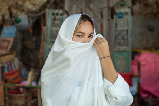 Portrait of a beautiful woman in Arabic clothing in Egypt during sunset