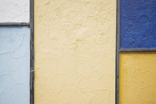 A vibrant and dynamic composition of beautifully textured wall sections in various stunning colors