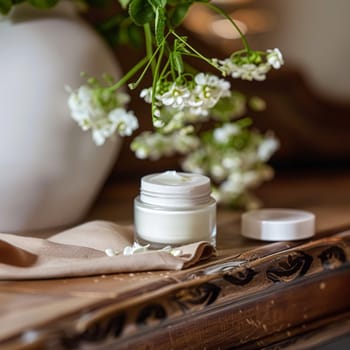 Cosmetic cream in a glass jar. Skin care concept. Background for beauty products
