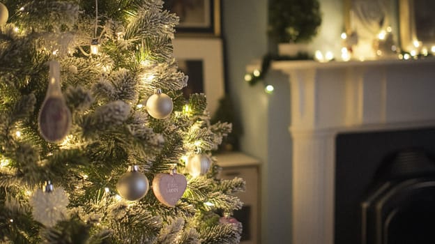 Christmas, holiday decor and country cottage style, cosy atmosphere, decorated Christmas tree in the English countryside house living room with fireplace, interior decoration idea
