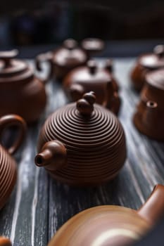 A captivating and enchanting display of beautifully crafted teapots that showcase intricate and stunning designs