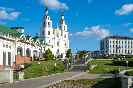 Minsk, Belarus - August 14, 2024.The Holy Spirit Cathedral stands majestically under a blue sky. This scene epitomizes tranquility and architectural beauty.