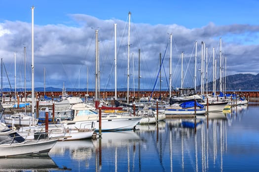 A sunny and partly cloudy day at the marina in Astoria, Oregon.