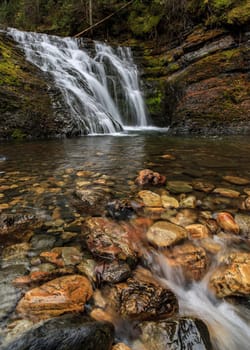 Water flows over rocks at lower Sweetcreek Falls, near Metaline, Washington.
