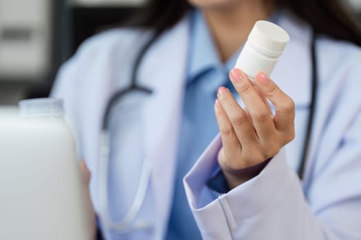 A doctor suggests medication during an online consultation, highlighting modern healthcare practices and patient convenience.