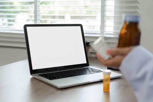 A doctor recommends medication for treatment through an online consultation, showcasing modern healthcare technology.