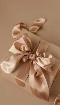 Elegant mocha mousse gift box adorned with a satin bow, set against a beige background. the box is slightly open, showcasing premium skincare products, emphasizing luxury and sophistication. ideal for luxury product promotions.