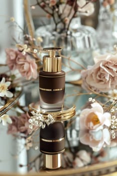 A luxury perfume ad showcasing a mocha mousse bottle adorned with gold details. styled amidst elegant floral arrangements on a mirrored surface, reflecting sophistication and opulence for high-end design and marketing.