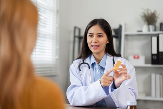 A female doctor offers expert health advice and guidance on medication use in a clinical environment.
